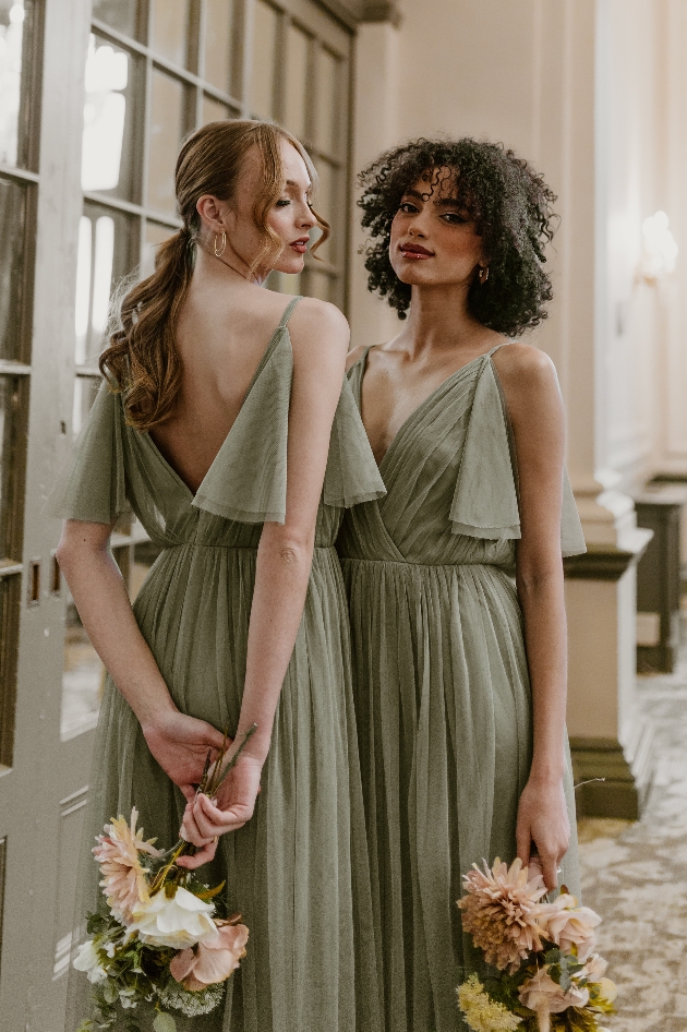 Maya Deluxe two models in green dresses