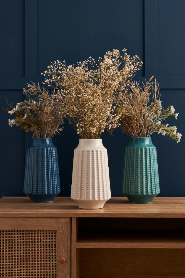 green white and blue ceramic vases